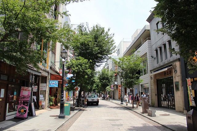 Other. Walk up to a tree-lined hill fashionable shops are lined up 4 minutes
