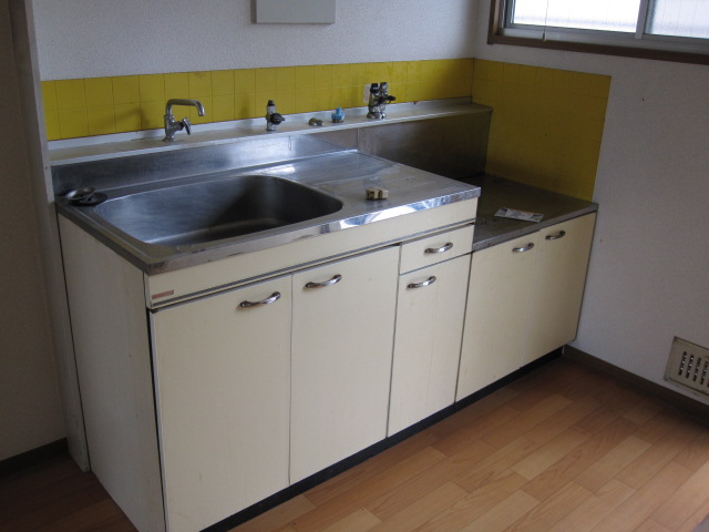 Kitchen. Put the two-burner gas stove