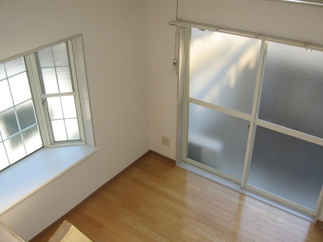 Living and room. Sense of openness is felt even in the view from the loft.