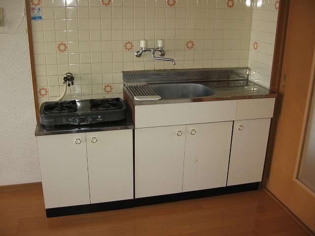 Kitchen. Gas table is installed in glad equipment