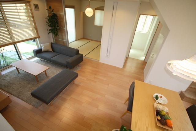 Living. Has been designed around the living-dining family gather.