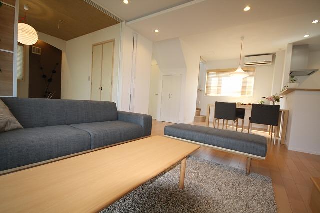 Living. Comfortable relaxing sofa. It was aligned with the dining table set.