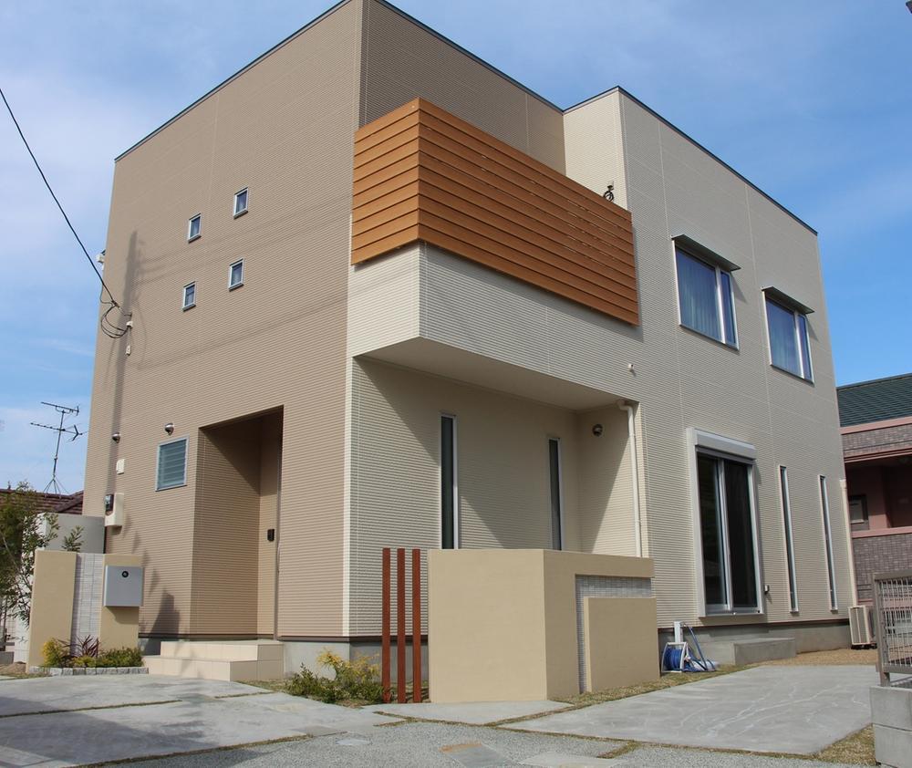 Local appearance photo. Model house appearance. Simple modern structure.