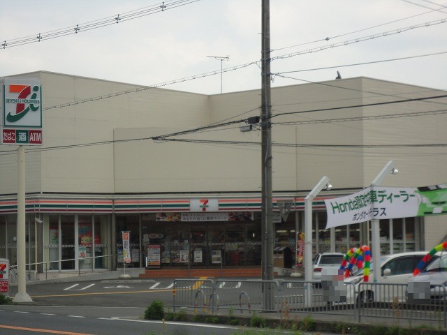 Convenience store. Seven-Eleven Kameoka Nishitsutsujigaoka store up (convenience store) 570m