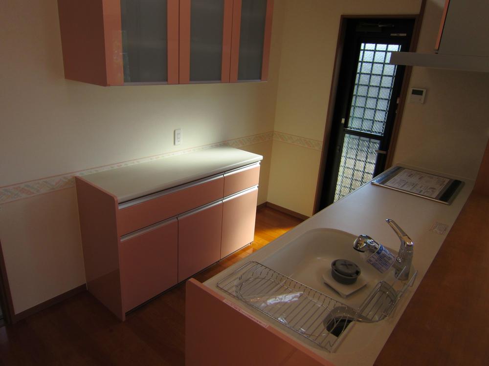 Kitchen. Cup board is peace of mind with earthquake-resistant latch. 