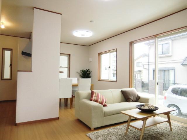Living. Same construction photos (living) South-facing bright living!