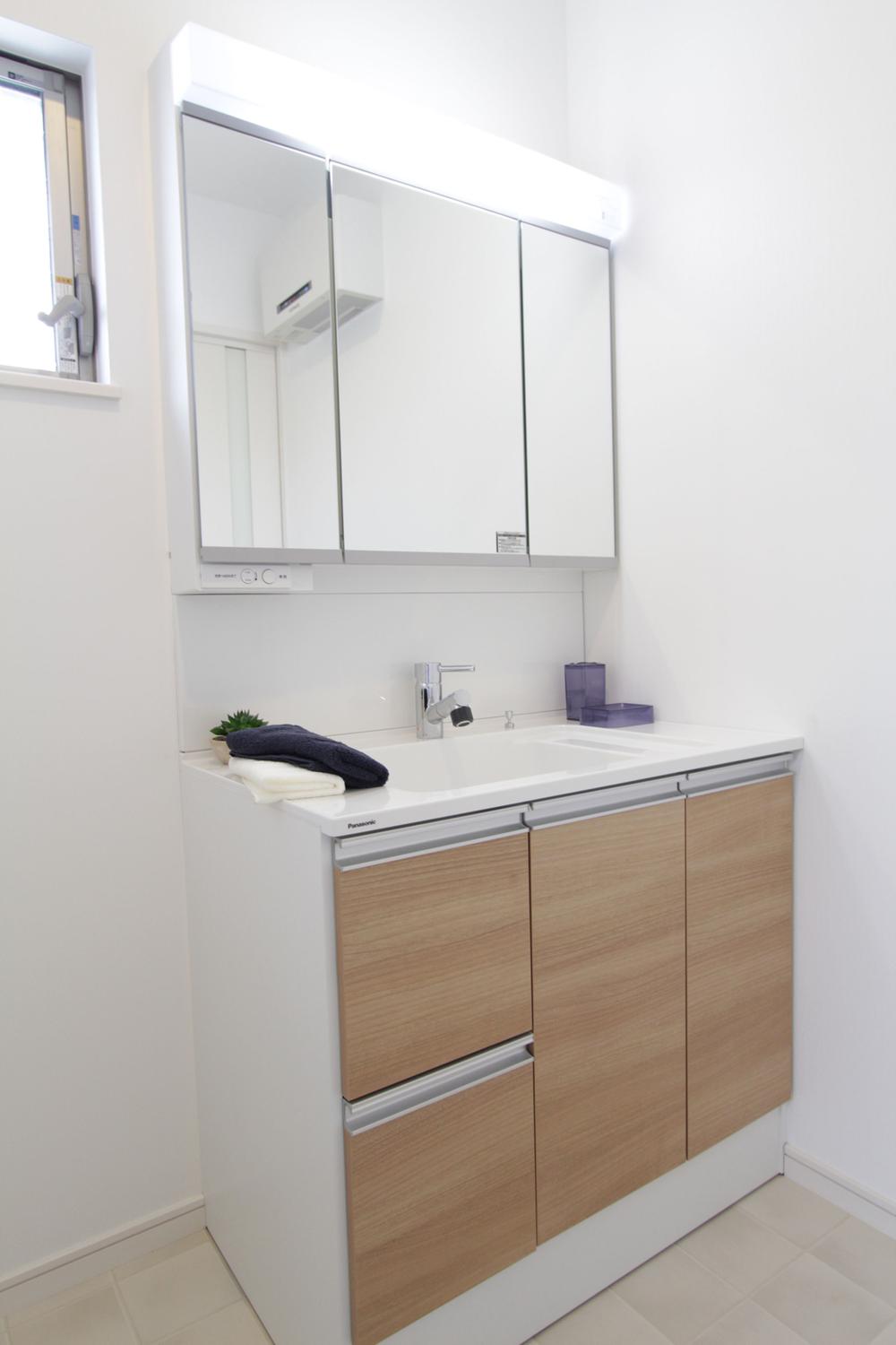 Building plan example (introspection photo). Wash basin of wide three-sided mirror