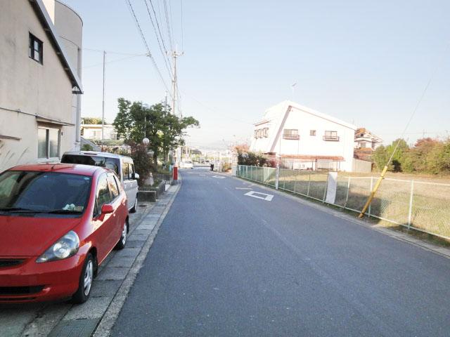 Local photos, including front road. Front road Spacious.