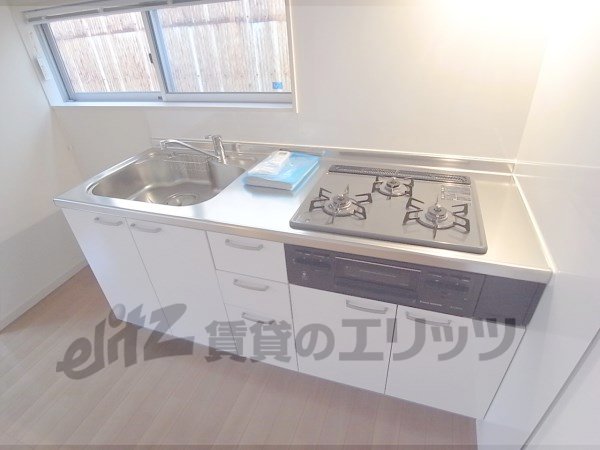 Kitchen. I enjoy cooking with a 3-burner stove.