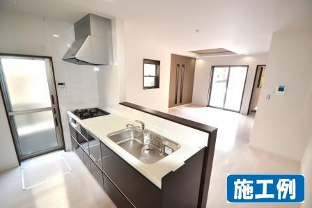 Model house photo. Popular face-to-face kitchen Our construction cases