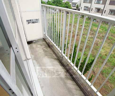 Balcony. Around is a quiet residential area.