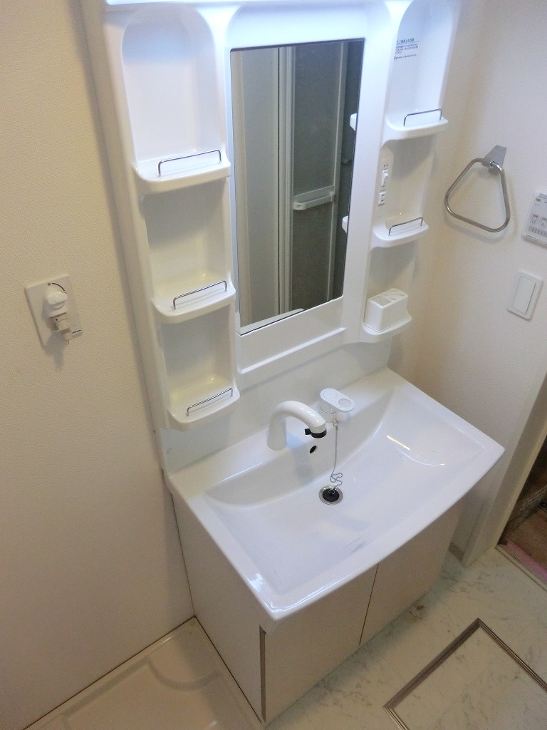 Washroom. With separate wash basin