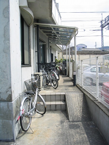 Other common areas. Bicycle is put on site. Back is the caretaker's home.