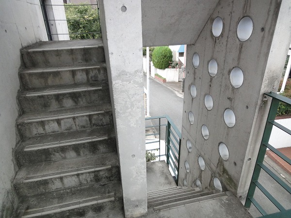 Entrance. Stylish concrete driving range