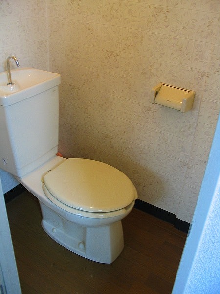 Toilet. The same is by Property of the room