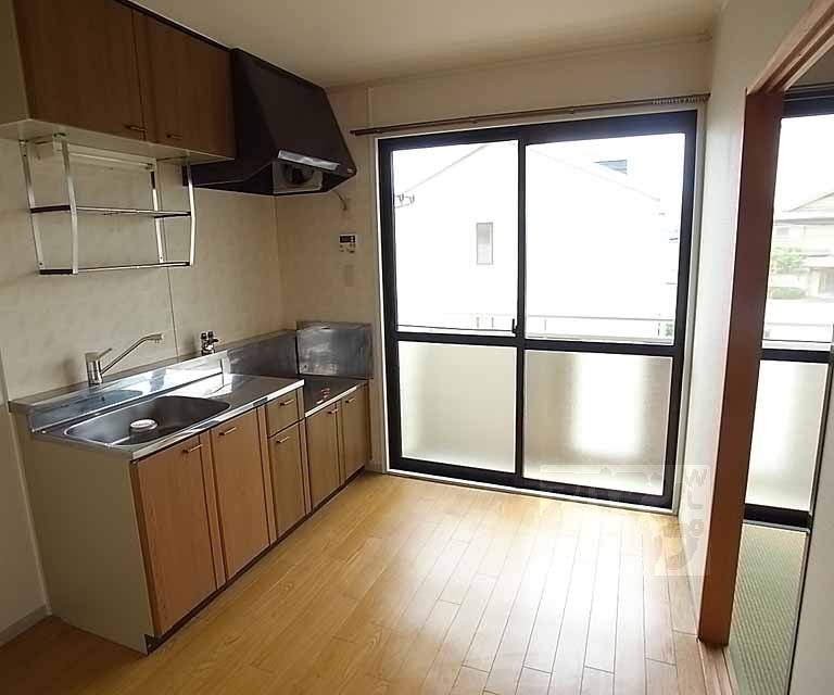 Living and room. Compact dining kitchen