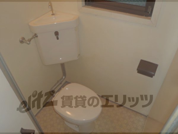Toilet. Toilet and bath is separate.