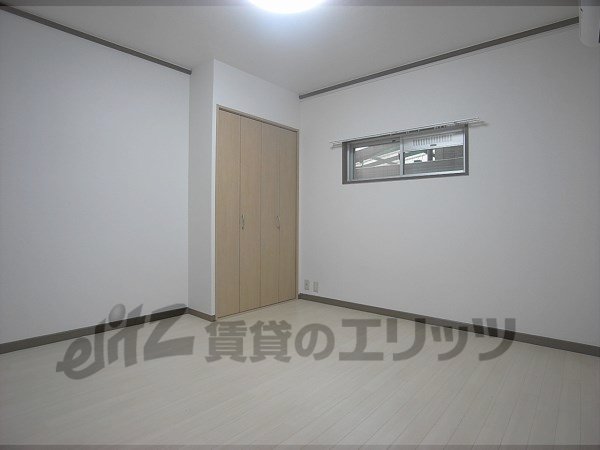 Living and room. It is a good room well-ventilated there is a small window.