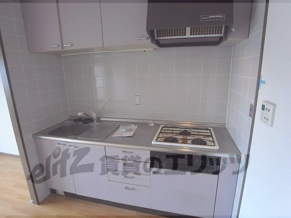 Kitchen. 3-neck is a gas stove with a system Kitchen