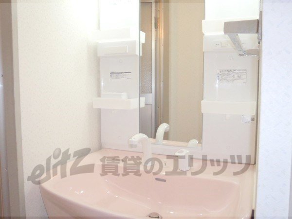 Washroom. It is a photograph of the 402 in Room.