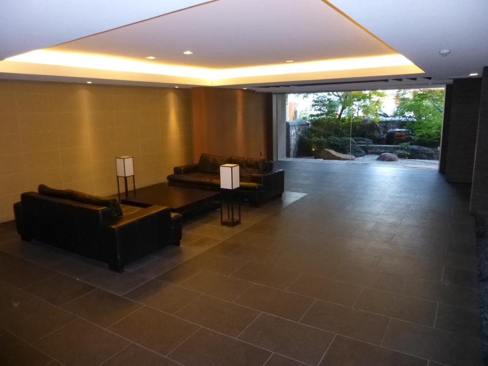 lobby. Adopt a black natural lava stone on the floor. It produces a solemn atmosphere.