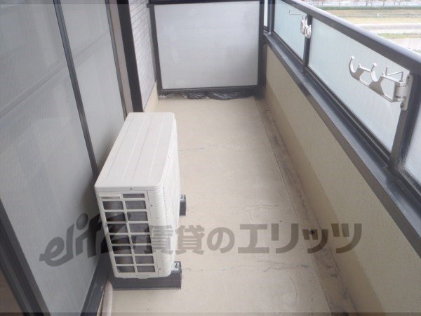 Balcony. It is a photograph of the 702 in Room.
