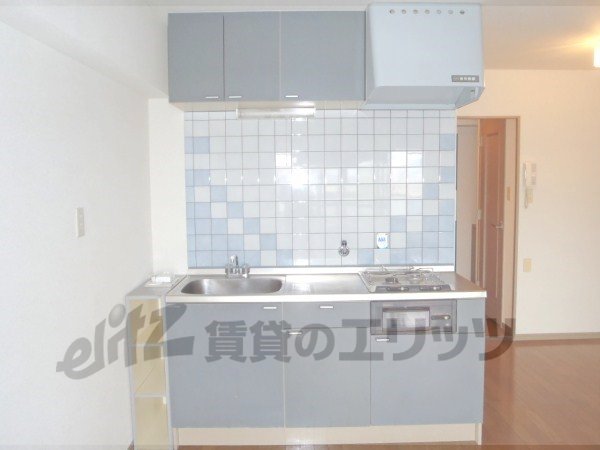 Kitchen. It is a photograph of the 702 in Room.