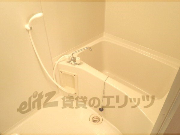 Bath. It is a photograph of the 702 in Room.