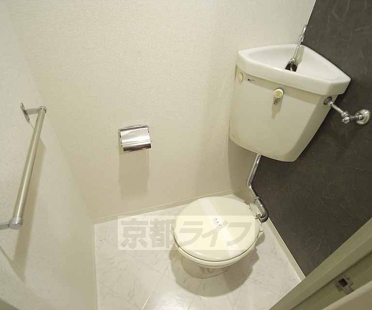 Toilet. It is a space that is settled