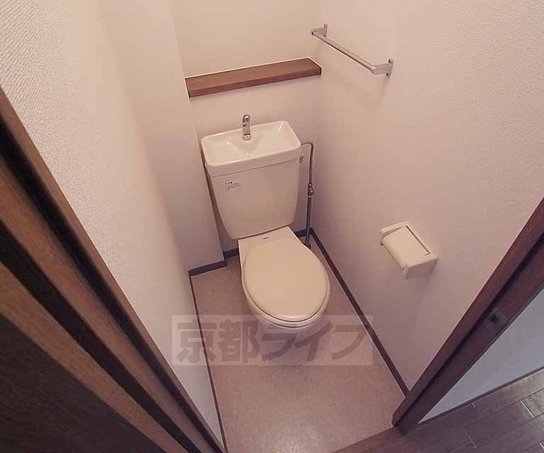 Toilet. It is also attached to, such as towel rack!