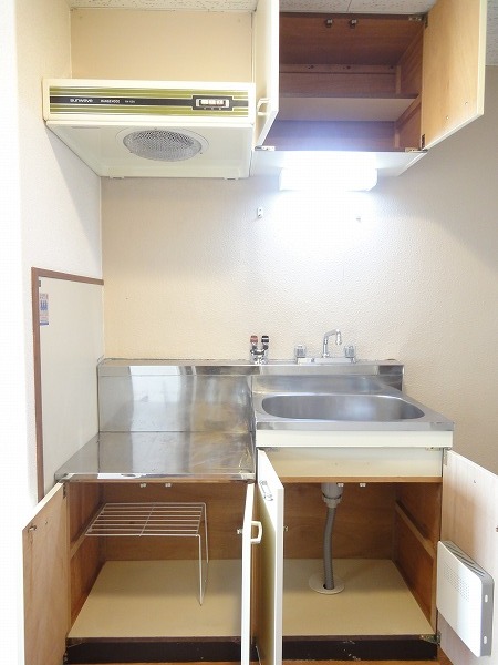 Kitchen. Kitchen storage is located in the up and down (the same apartment by room)