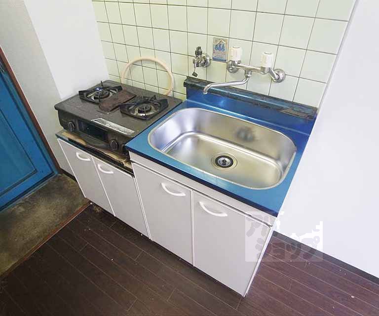 Kitchen. Two-burner stove installation-friendly kitchen is shiny