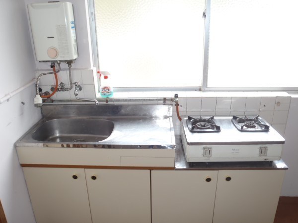 Kitchen. It is a gas stove in a two-necked "