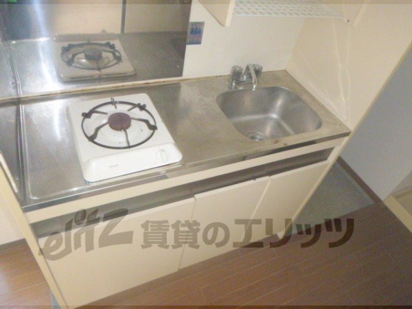 Kitchen. There is gas stove 1-neck