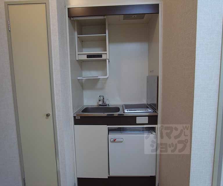 Kitchen. It is a compact kitchen