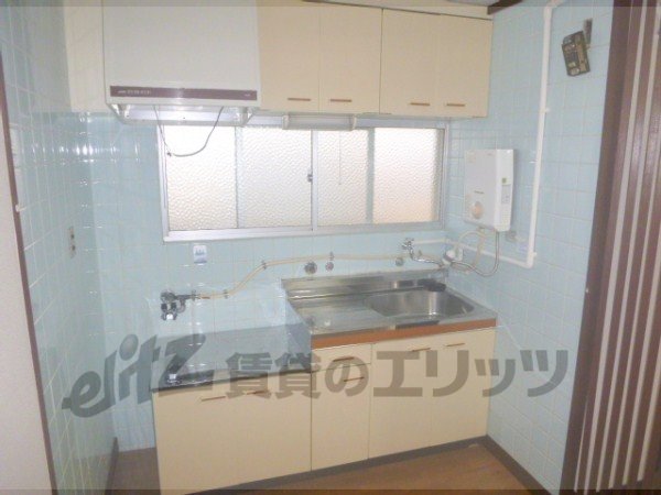 Kitchen. Two-burner stove is installed can be a large kitchen of