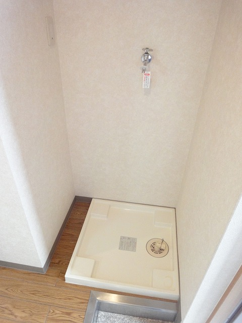 Other Equipment. Washing machine in the room (is a photograph of the same apartment by Room No.)