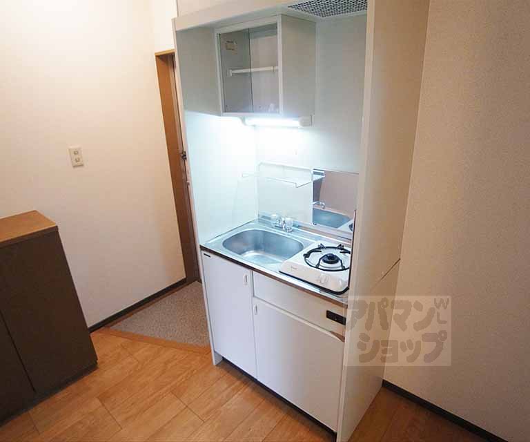 Kitchen. Is a compact kitchen with storage