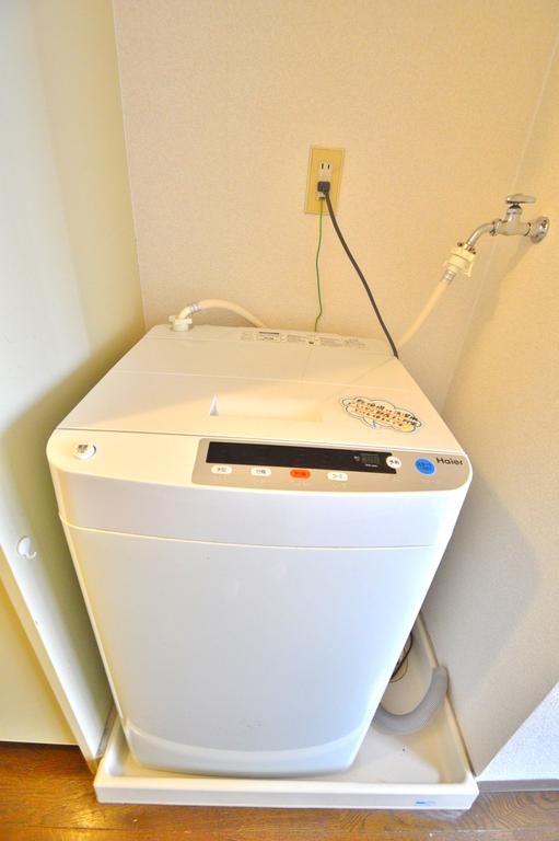 Other Equipment. Washing machine in the room