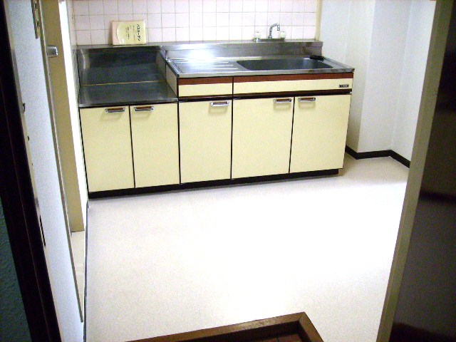 Living and room. It is around the spacious kitchen.