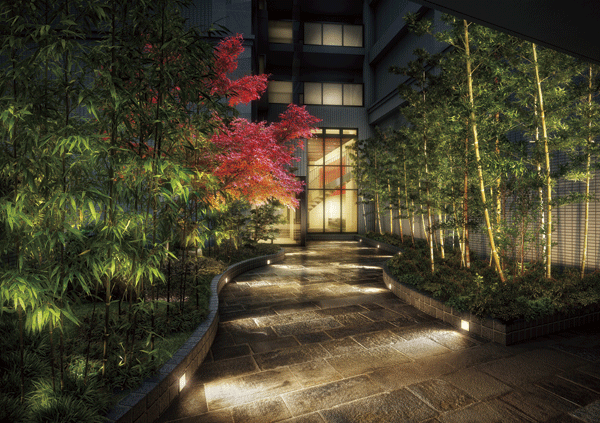 Features of the building.  [Garden as] Courtyard spread and passing around porch. Stone pavement, Sunshine filtering through foliage, Fluctuations in the wind, Bamboo curtain heal the mind and body, Colorful flowers and trees is the space to stimulate the five senses (Rendering)