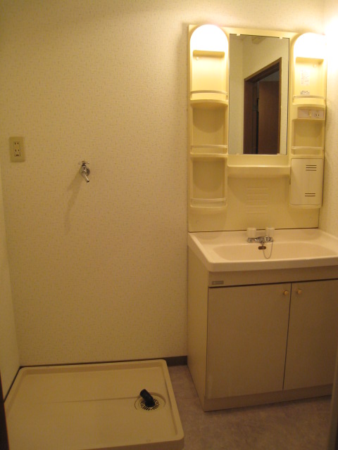 Washroom. Independent wash basin and washing machine inside the room can be installed