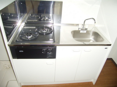 Kitchen. Two neck is with a gas stove.