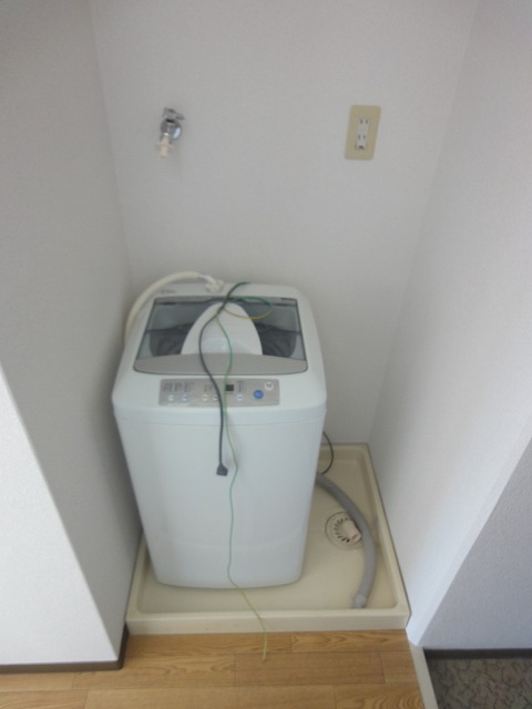 Other Equipment. Washing machine in the room