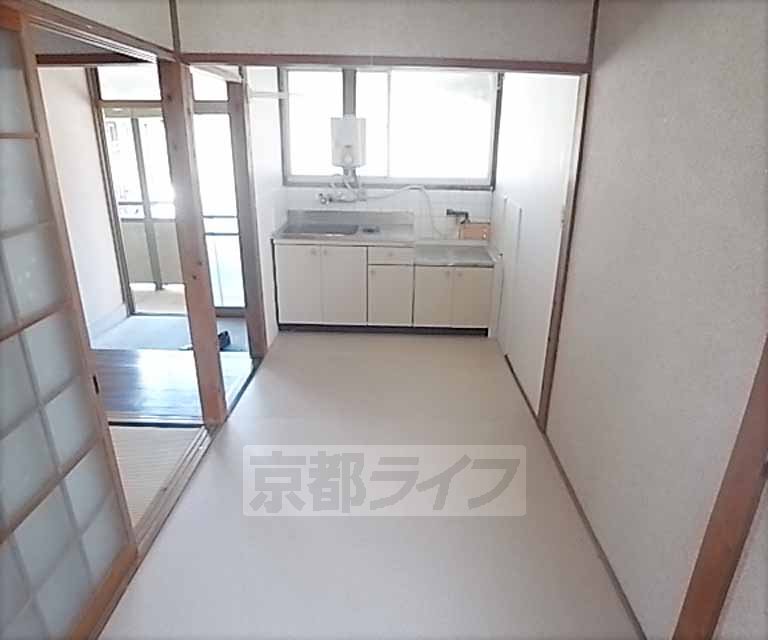 Kitchen. Dining room is. Widely clean