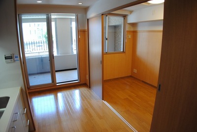 Living and room. It is a Western-style room there may be next to the living room.