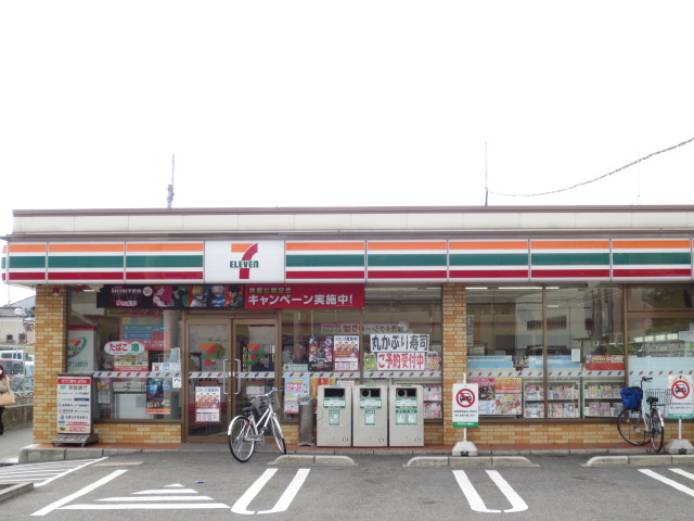 Convenience store. Seven-Eleven Uji Kintetsu Kokura Station Nishiten (convenience store) to 121m