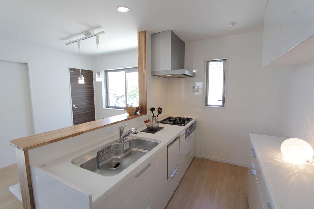 Kitchen. Convenient to spread and dishes because there is a wide space in the cabinet in the kitchen. 