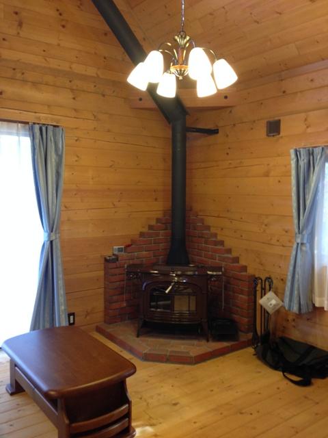 Same specifications photos (living). There is a wood-burning stove