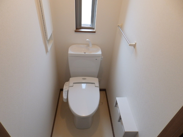 Toilet. It is with a hot-water heating toilet seat! You can also also has ventilation window!